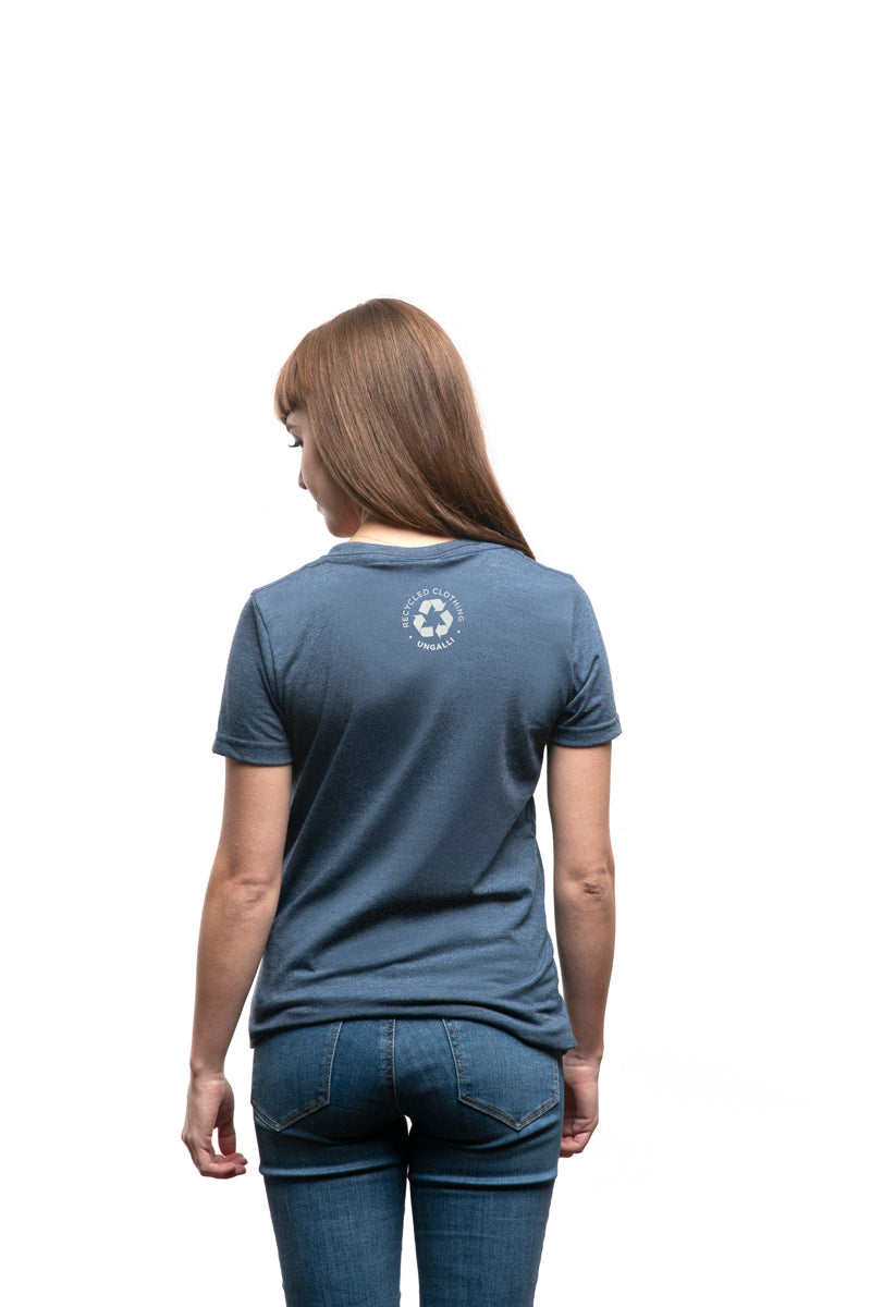 Women's short sleeve organic blue t-shirt with text reading: "Never forget where your voyage starts"