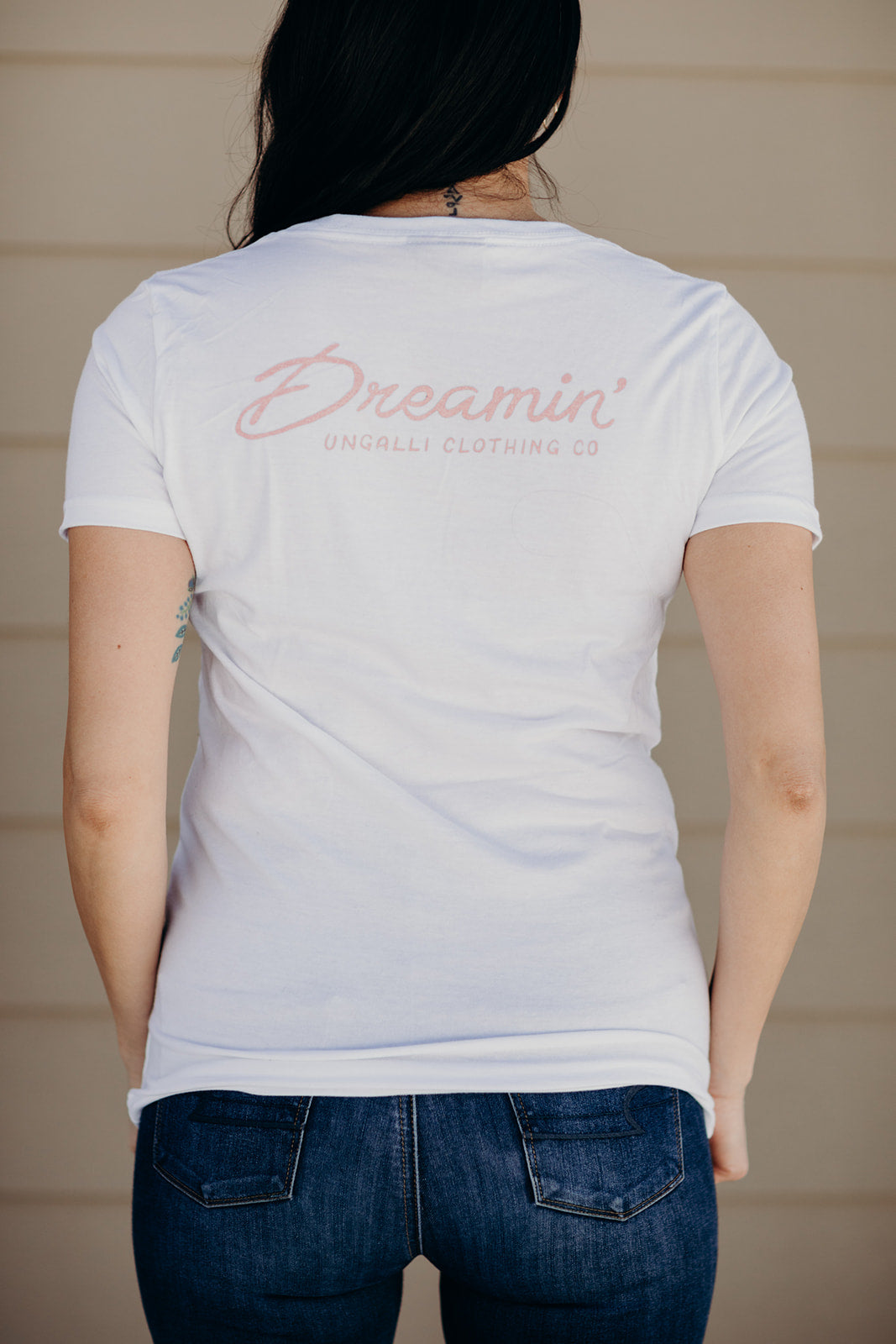 Women's organic white t-shirt with airplane dreamin' logo on front