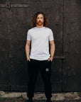 Black ethically made unisex joggers with white detailing