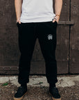 Black ethically made unisex joggers with white detailing
