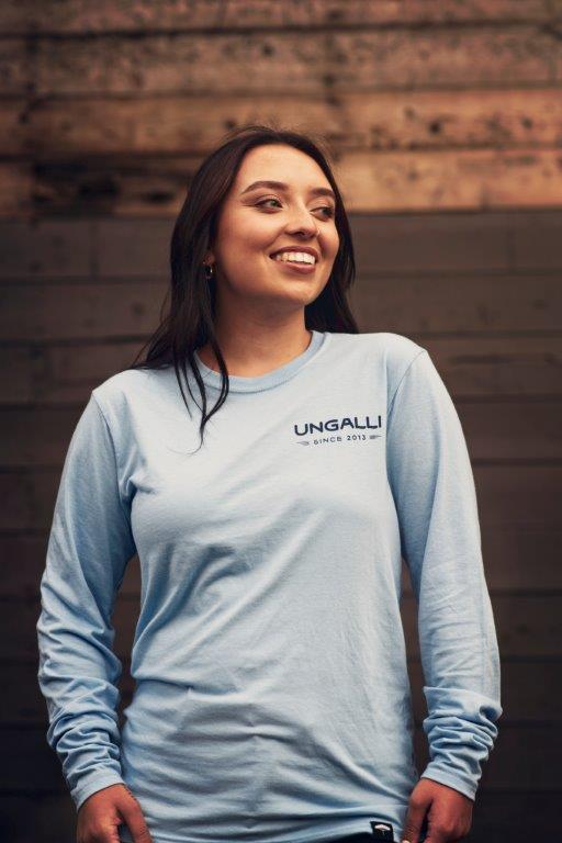 Ethically made unisex blue skies long sleeve shirt with text on back reading: "Dream big. Work hard."