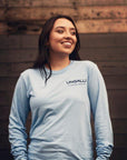 Ethically made unisex blue skies long sleeve shirt with text on back reading: "Dream big. Work hard."