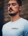 Ethically made unisex blue skies long sleeve shirt with text on back reading: "Dream big. Work hard."