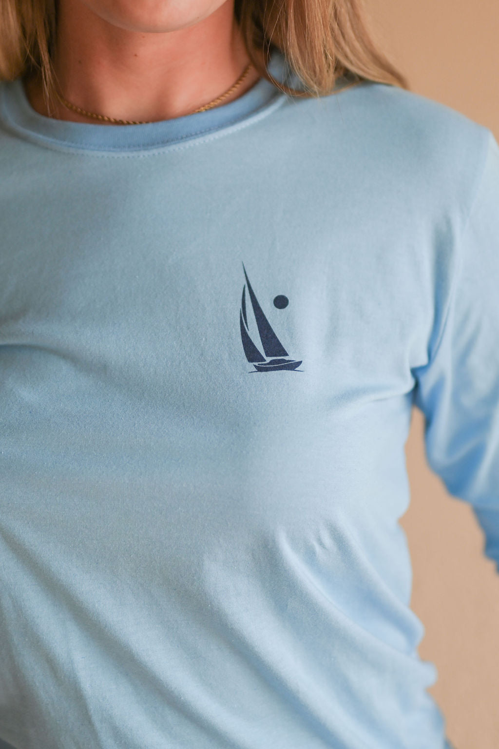 Unisex organic Lake Superior long sleeve light blue shirt with boat logo and text