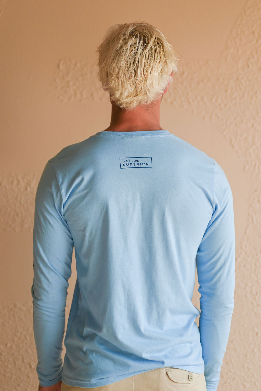 Unisex organic Lake Superior long sleeve light blue shirt with boat logo and text