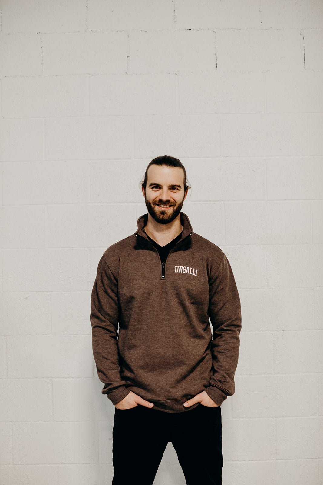 Brown unisex recycled 1/4 zip sweater with small Ungalli logo in white on front