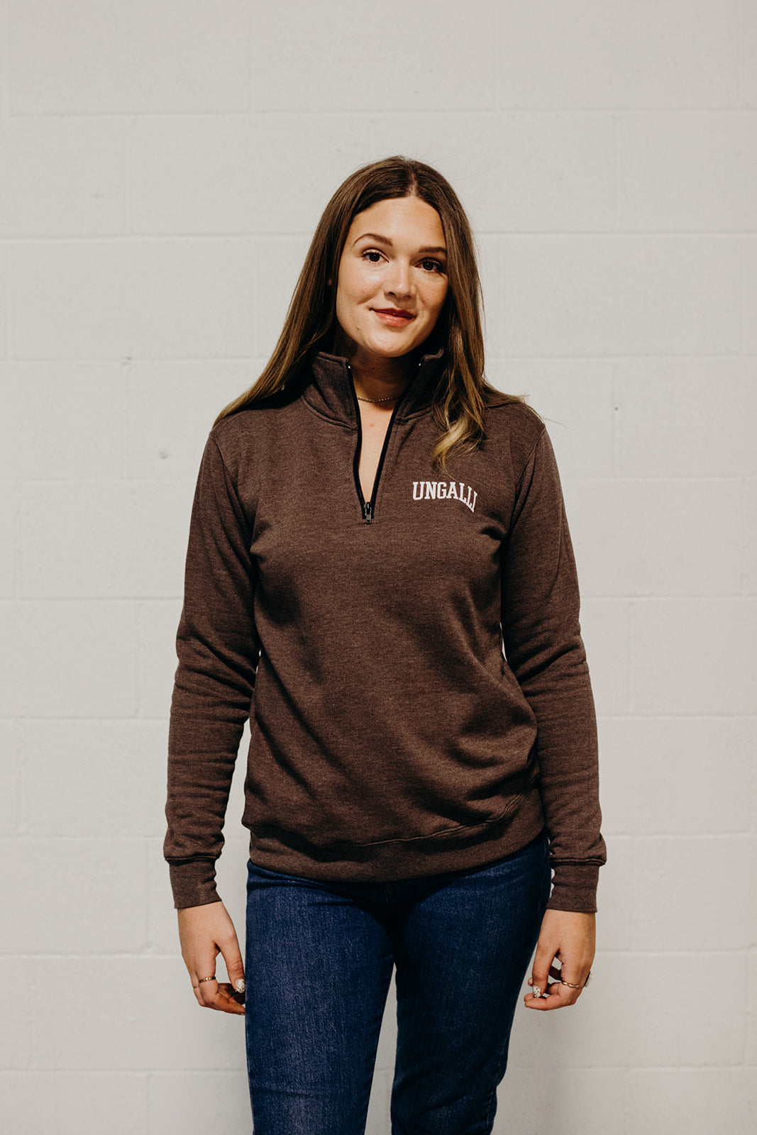 Brown unisex recycled 1/4 zip sweater with small Ungalli logo in white on front