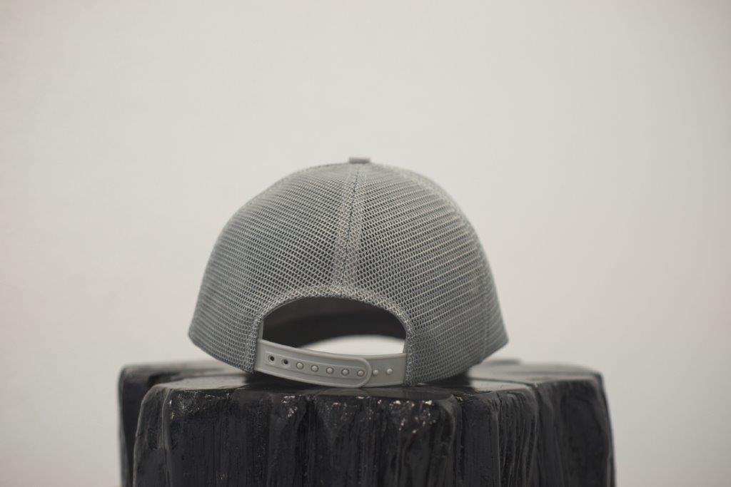 Unisex ethically made flat brim snapback hat in black or grey with white Ungalli logo on front