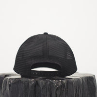 Unisex ethically made flat brim snapback hat in black or grey with white Ungalli logo on front