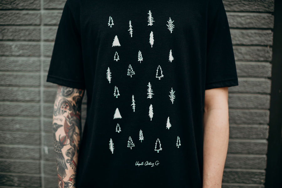 Unisex black organically made t-shirt with white tree design across front