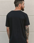Ethically made unisex t-shirt in black with small white Ungalli tree on front