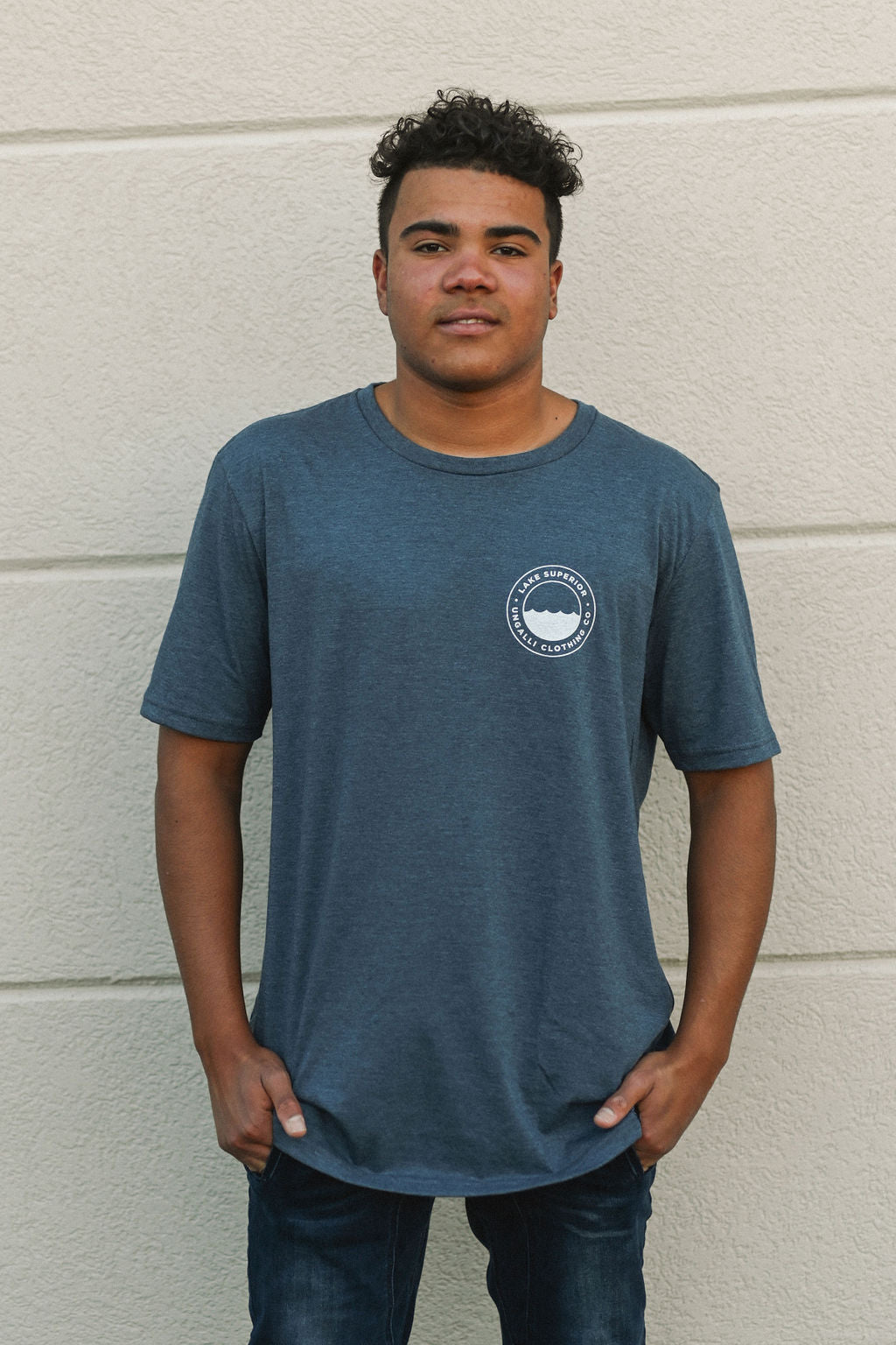 Organically made unisex short sleeve t-shirt in blue with white Lake Superior logo on front