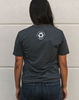 Recycled grey short sleeve unisex t-shirt with text on front that reads: "human change climate change"