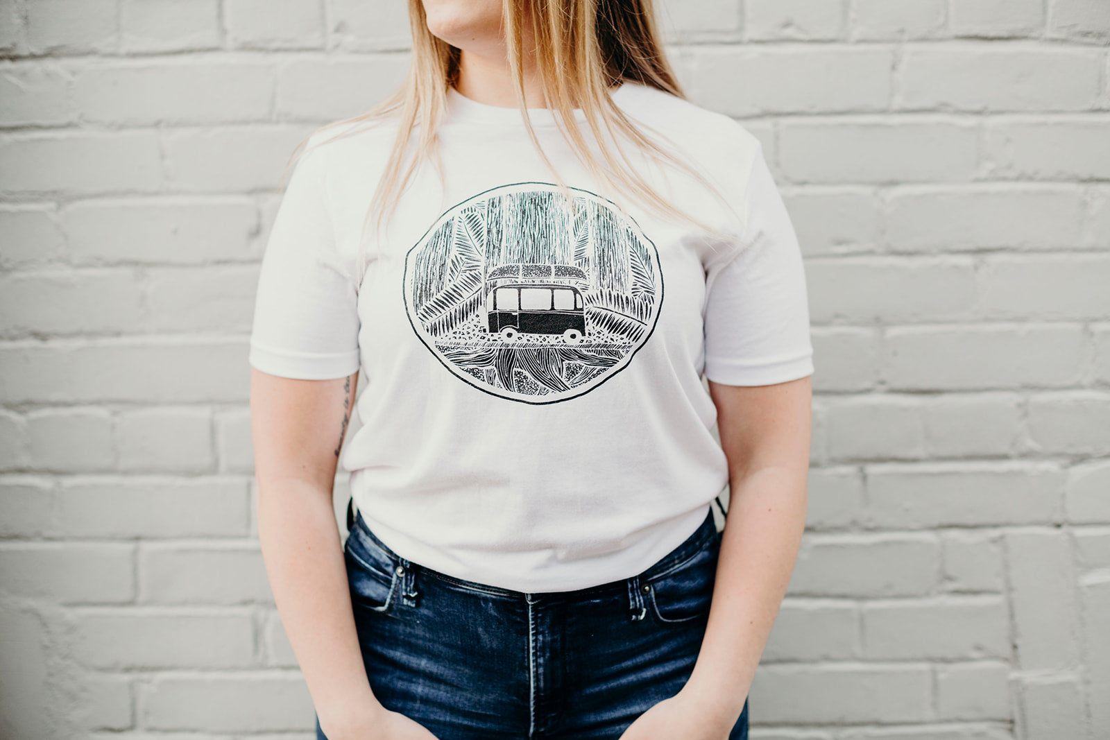 Unisex ethically made white t-shirt with Volkswagen logo on front
