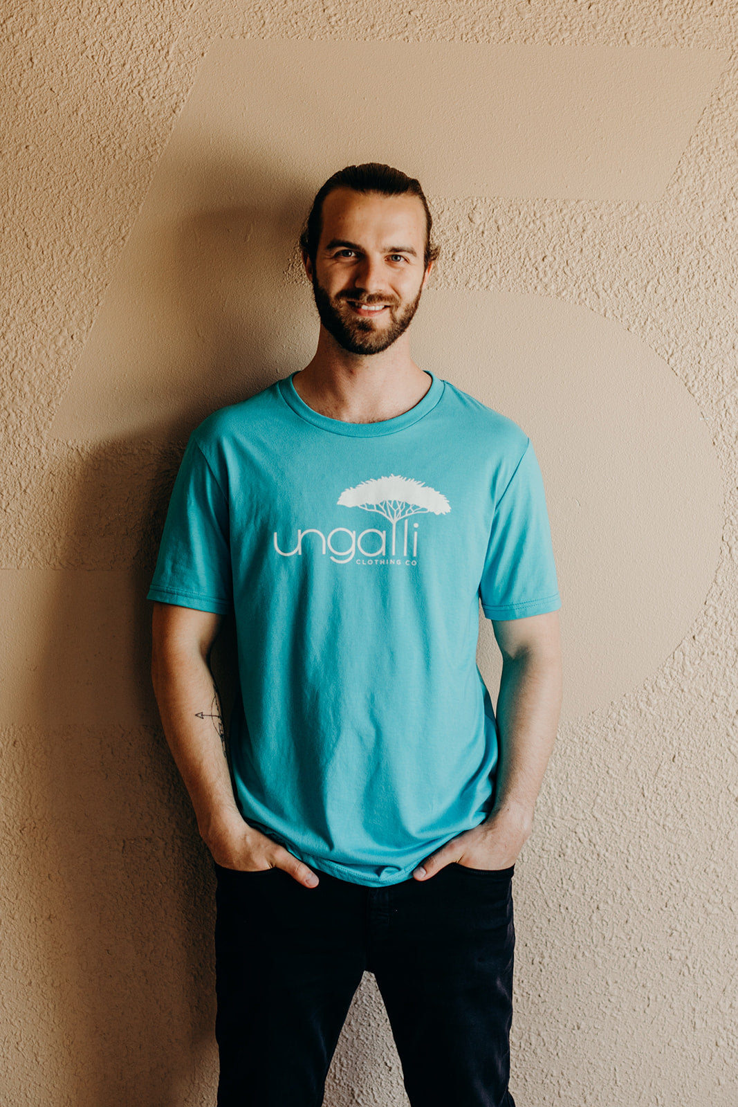 Unisex ethically made short sleeve teal t-shirt with white Ungalli logo on front