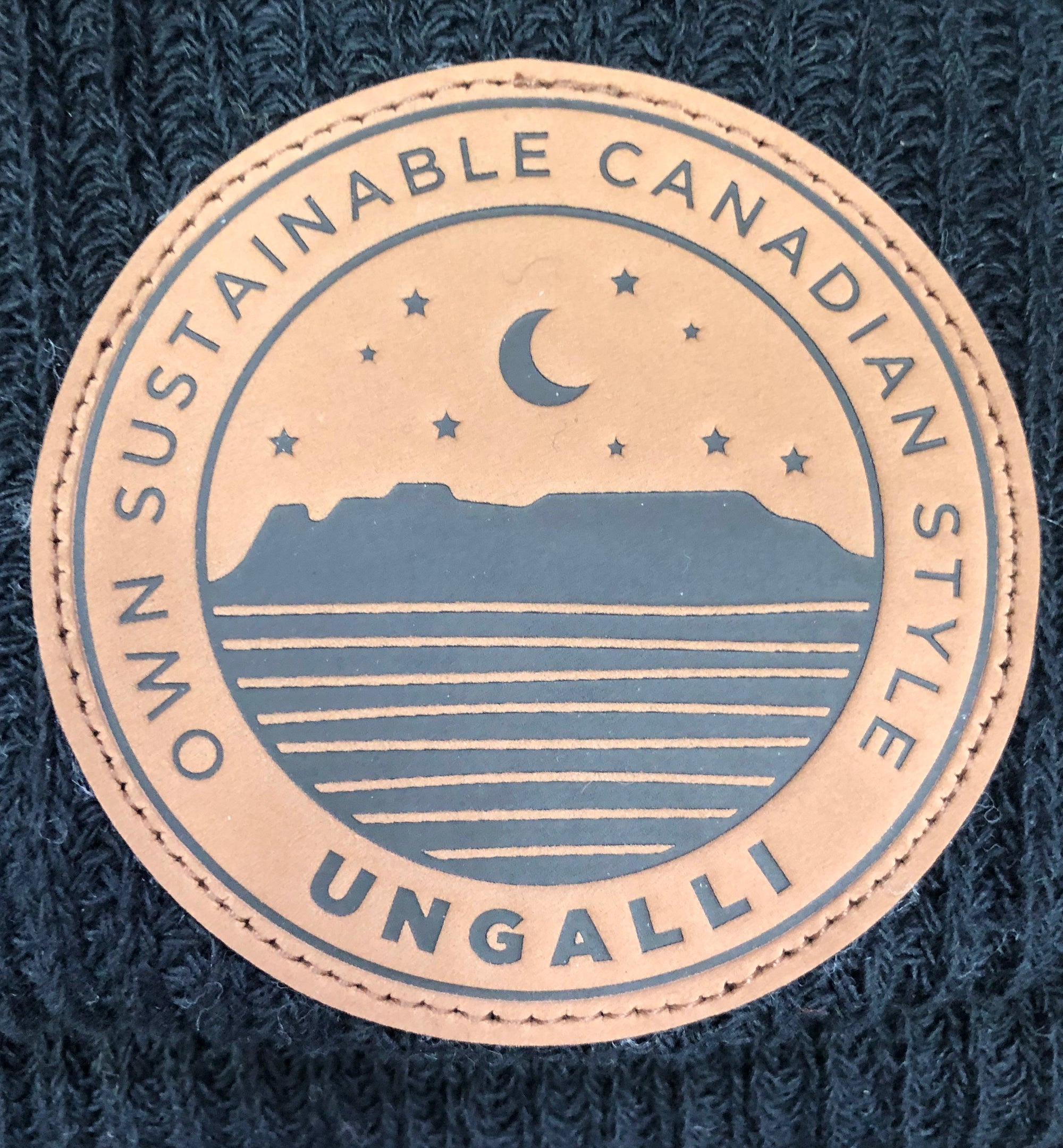 Unisex organic toque in black, green or grey with brown sleeping giant patch