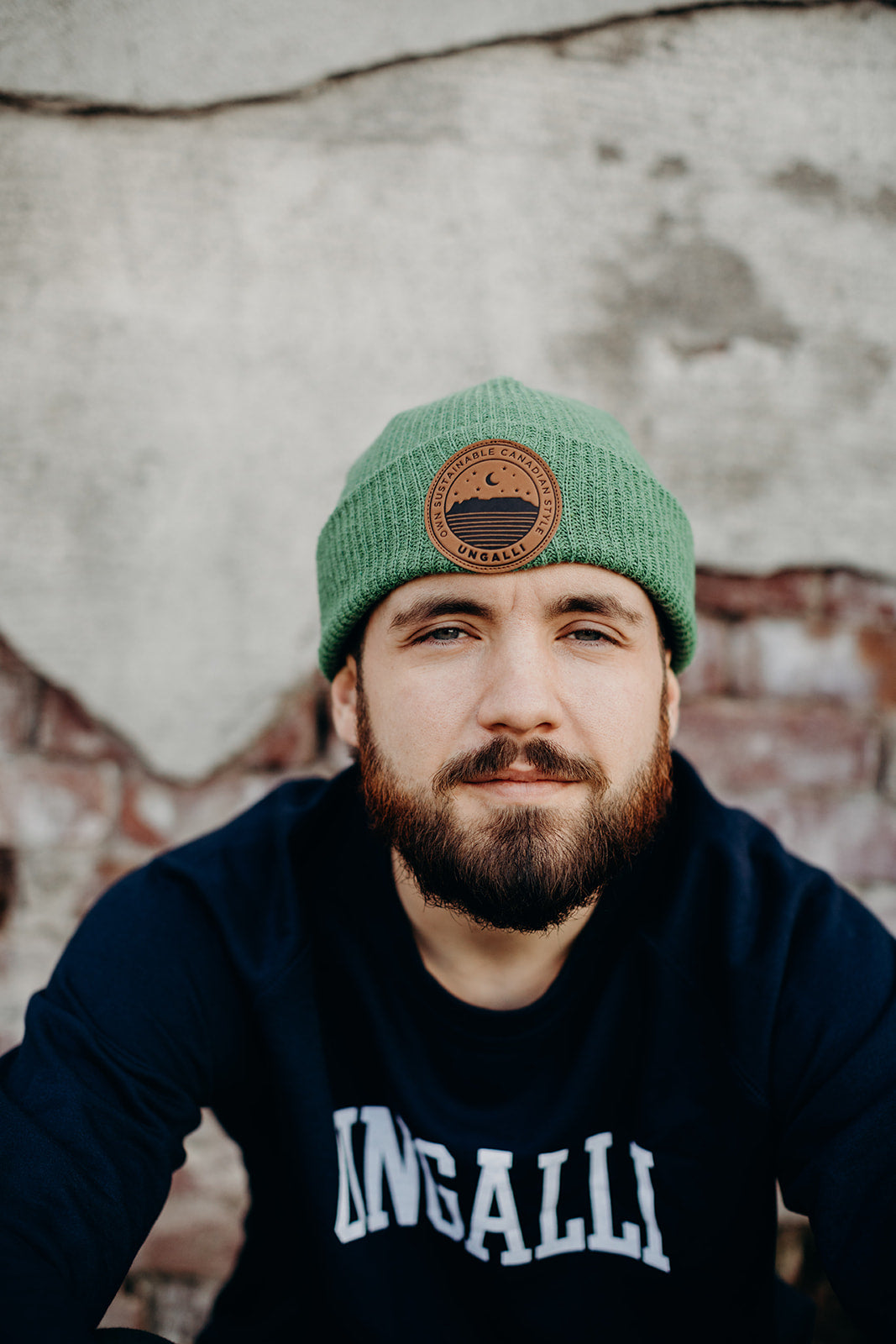 Unisex organic toque in black, green or grey with brown sleeping giant patch