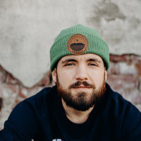 Unisex organic toque in black, green or grey with brown sleeping giant patch
