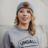 Unisex organic toque in black, green or grey with brown sleeping giant patch
