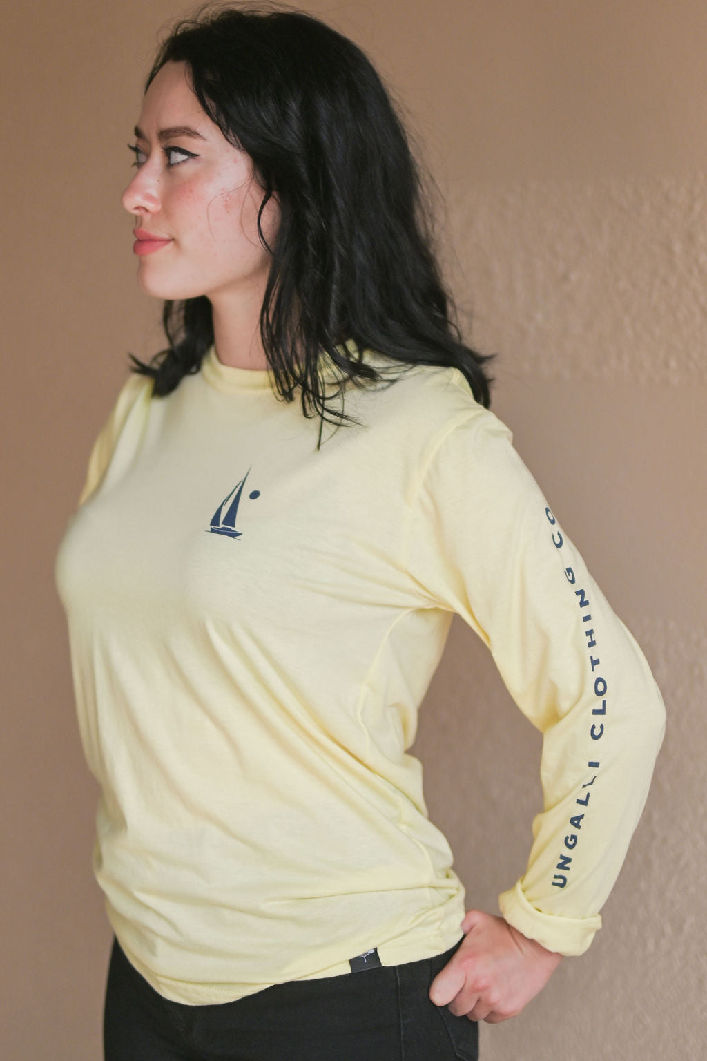 Unisex long sleeve organic shirt with blue sail boat logo and text