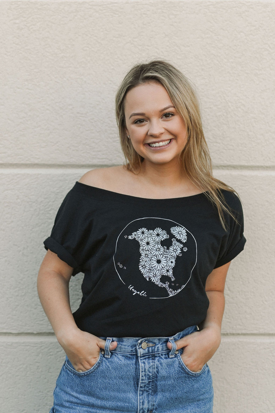 Women's black ethically sourced off the shoulder t-shirt with floral map design on front