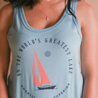 Women's sustainable blue tank top with Sail Superior logo on front