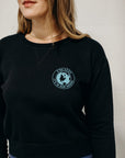 Women's sustainably made black cropped hoodie with brand logo