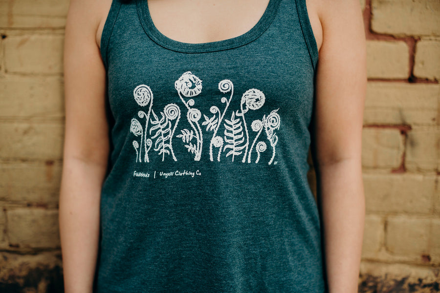 Women's ethically made green tank top with fiddlehead design on front