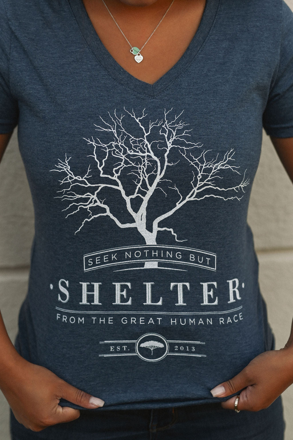 Organic blue short sleeve women&#39;s shirt with &#39;shelter&#39; logo