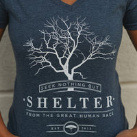 Organic blue short sleeve women's shirt with 'shelter' logo