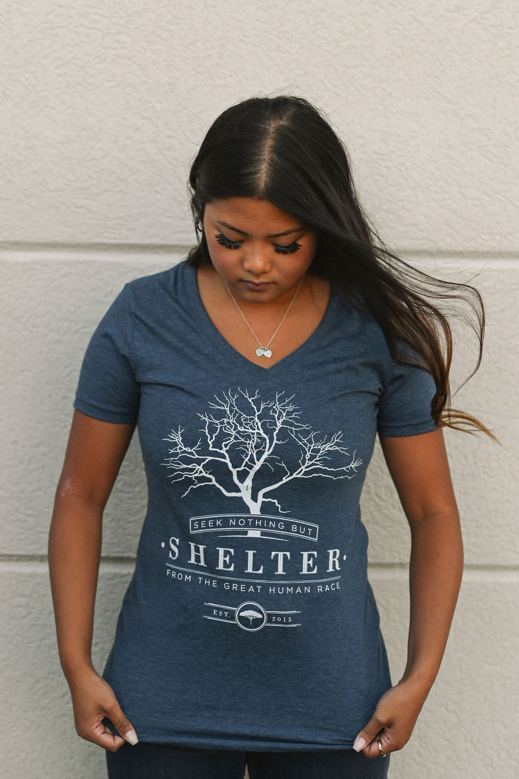 Organic blue short sleeve women&#39;s shirt with &#39;shelter&#39; logo