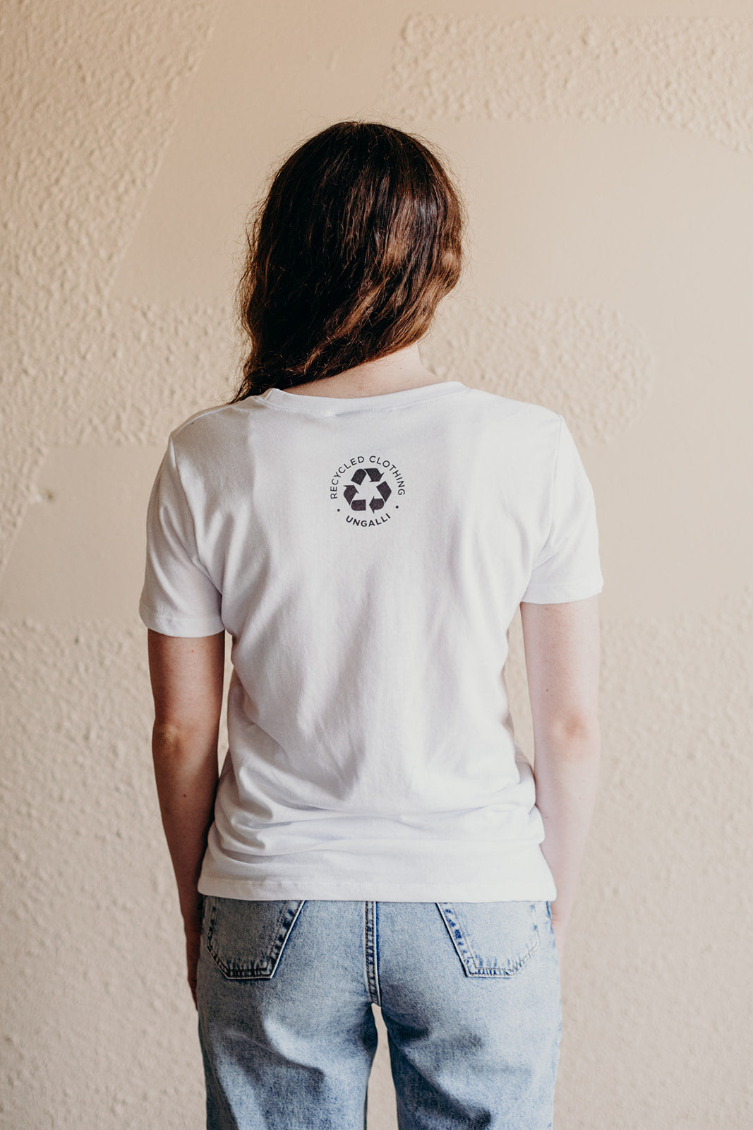 Women's white organically made t-shirt with bee design on front