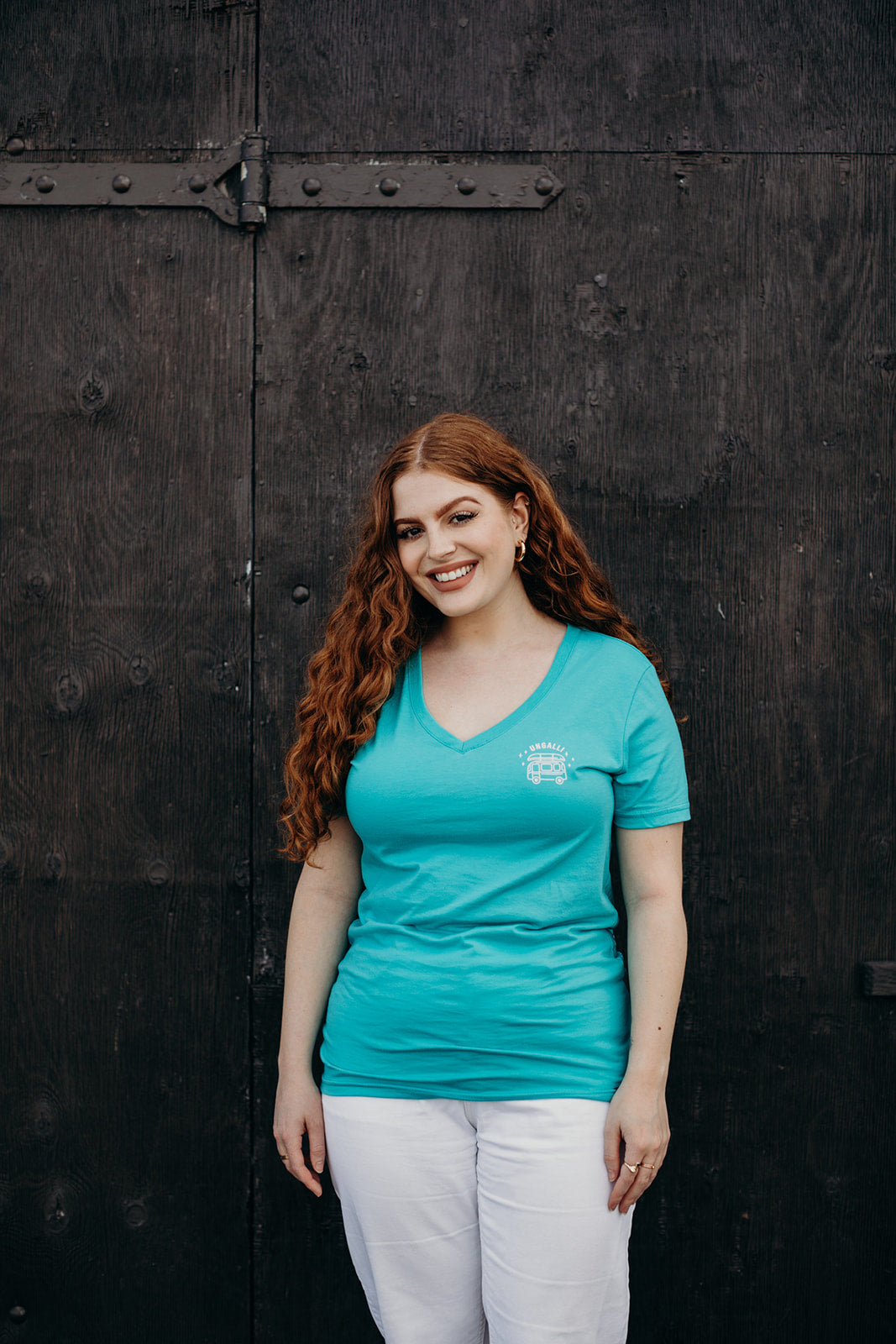 Women's ethically made teal v neck t-shirt with white details