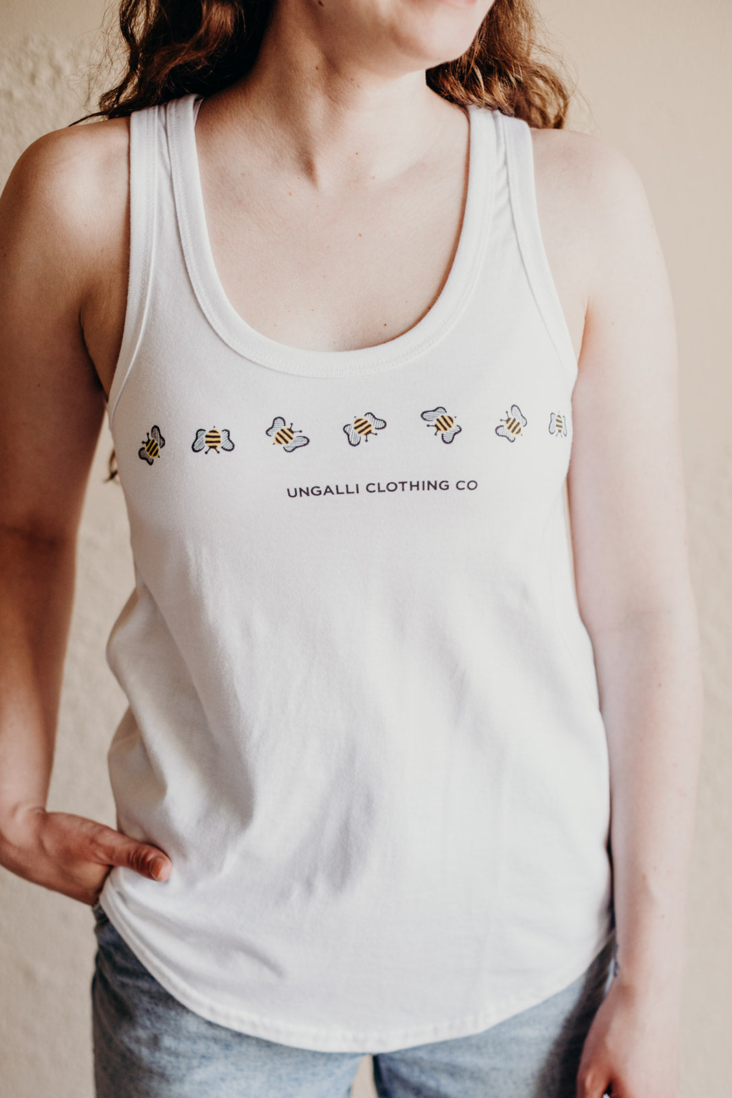Women's recycled white tank top with bee print across front