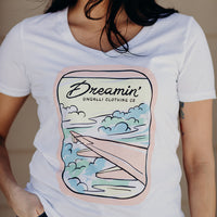 Women's organic white t-shirt with airplane dreamin' logo on front