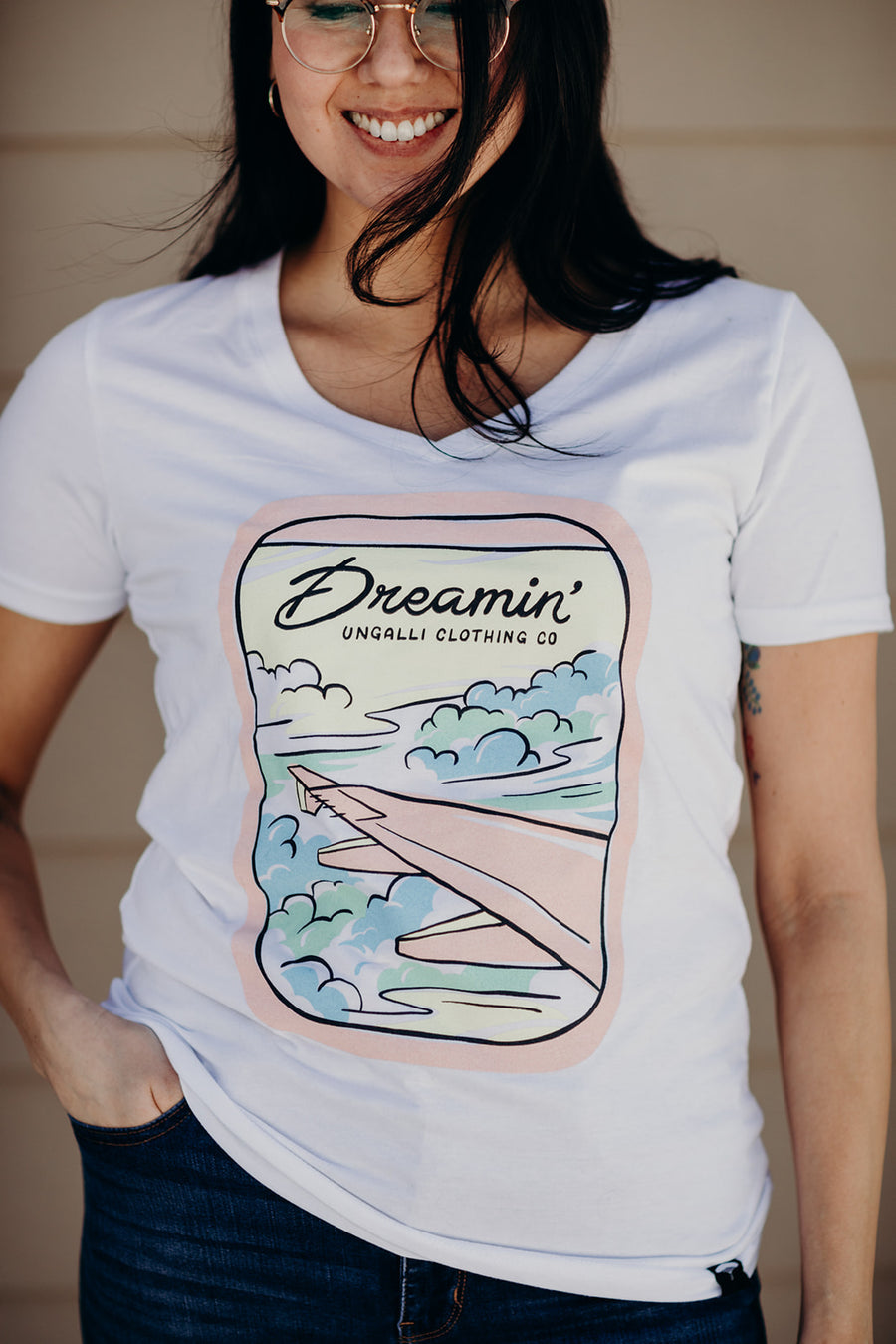 Women's organic white t-shirt with airplane dreamin' logo on front