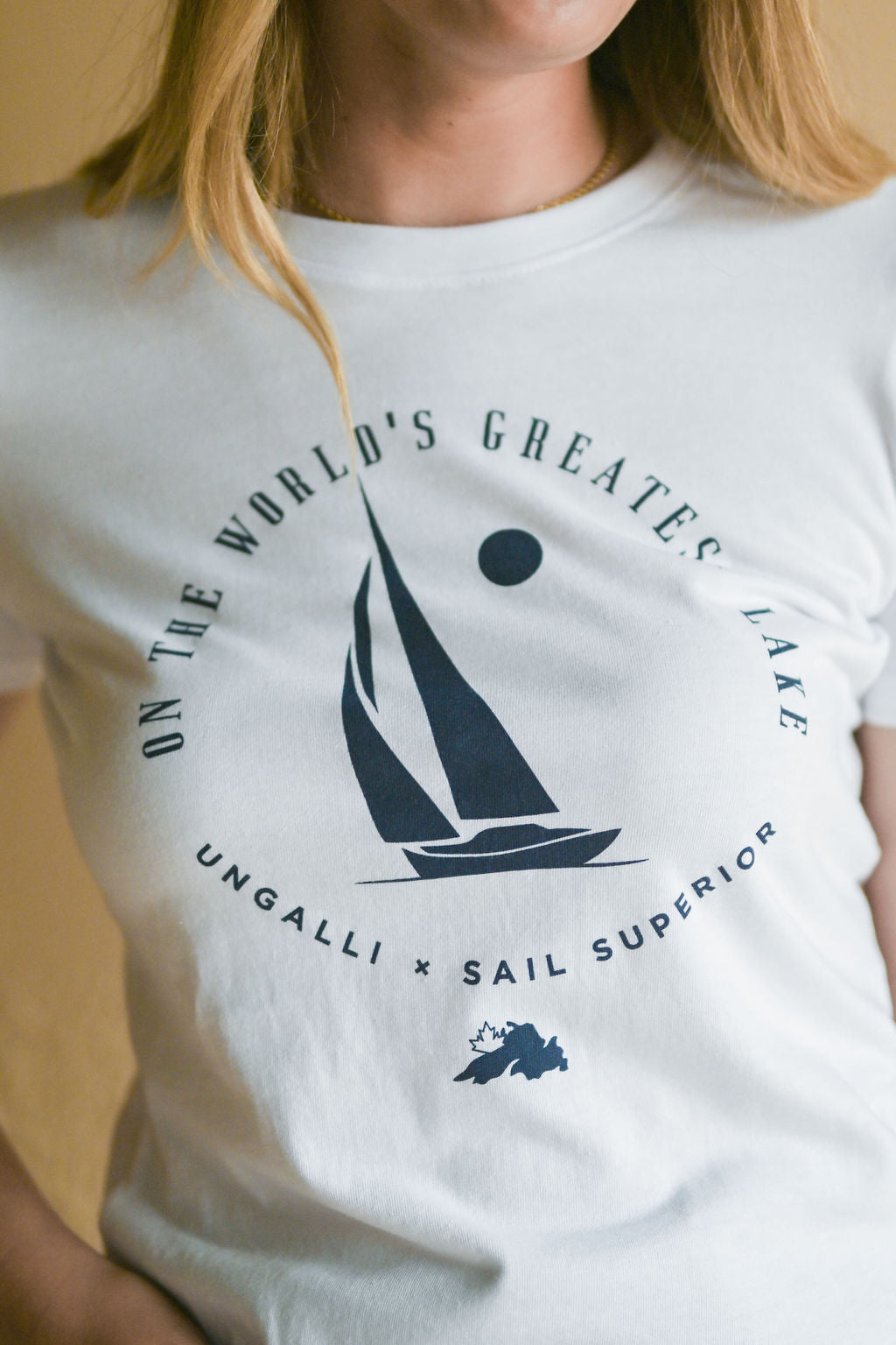 Women&#39;s recycled short sleeve white t-shirt with Sail Superior logo