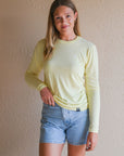 Unisex ethically made long sleeve yellow shirt with small white ungalli tree on front