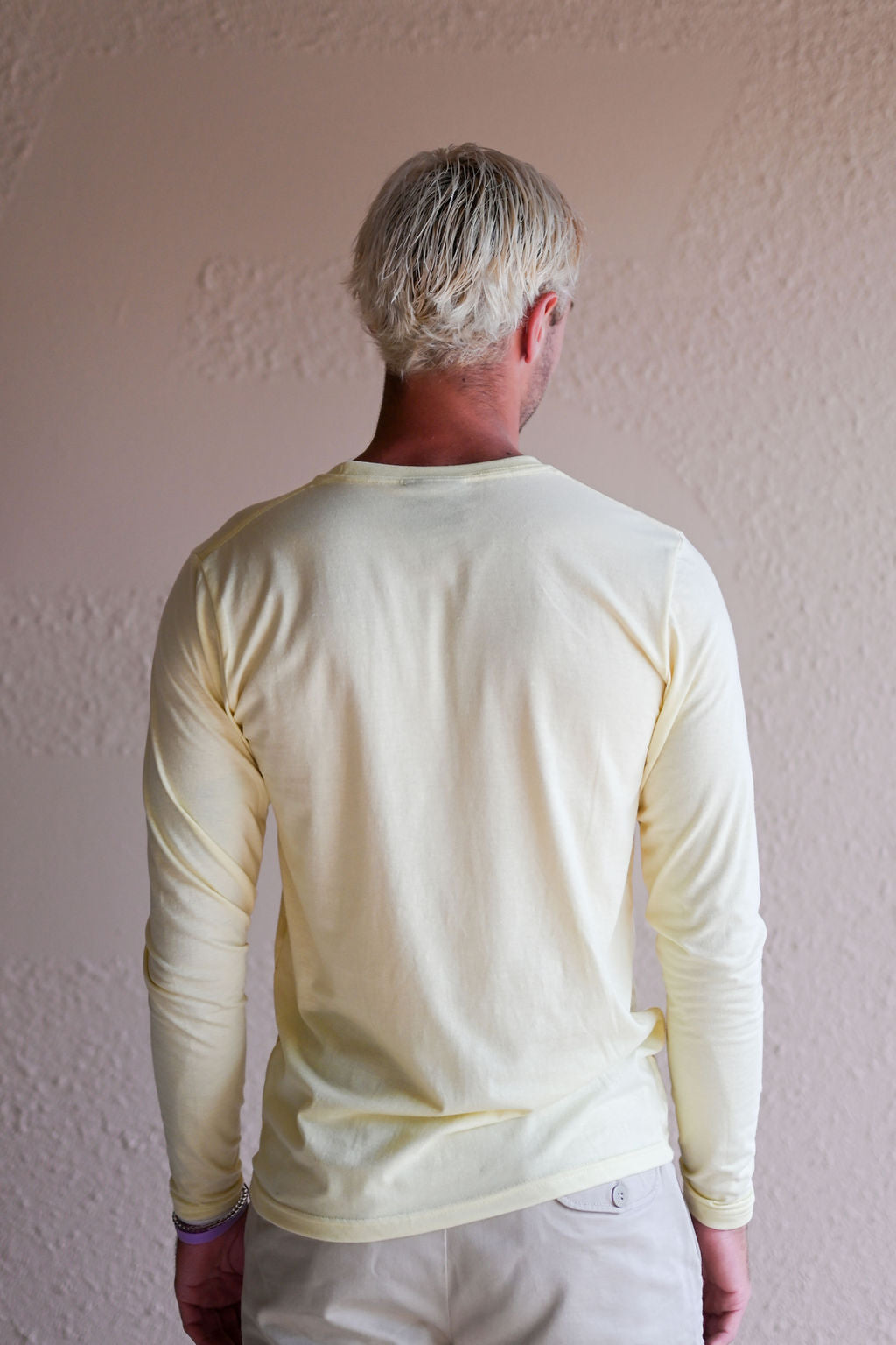 Unisex ethically made long sleeve yellow shirt with small white ungalli tree on front