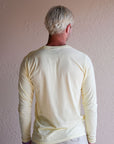 Unisex ethically made long sleeve yellow shirt with small white ungalli tree on front