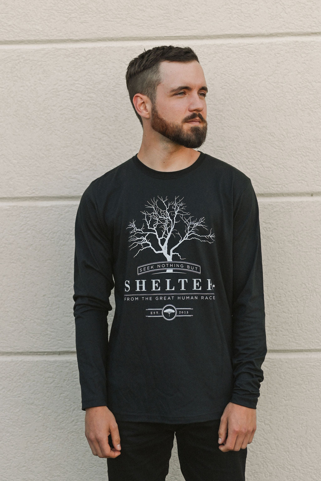 unisex recycled black long sleeve with white text