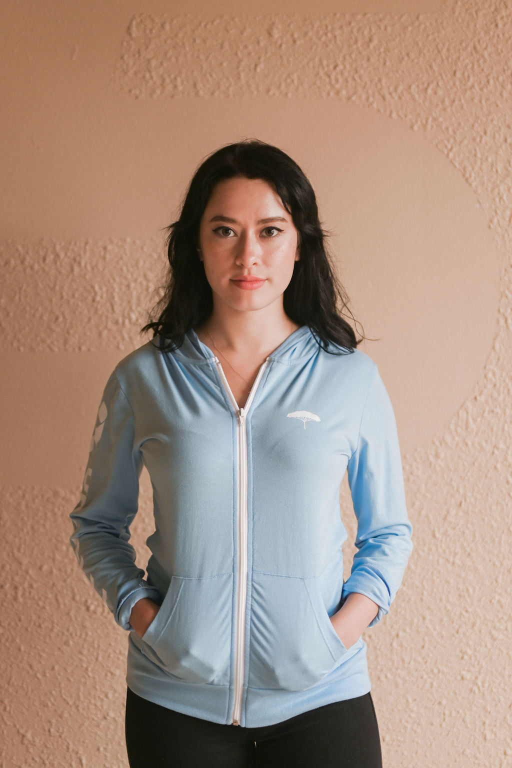 Organic unisex blue light weight zip up hoodie with white details