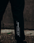 Black ethically made unisex joggers with white detailing
