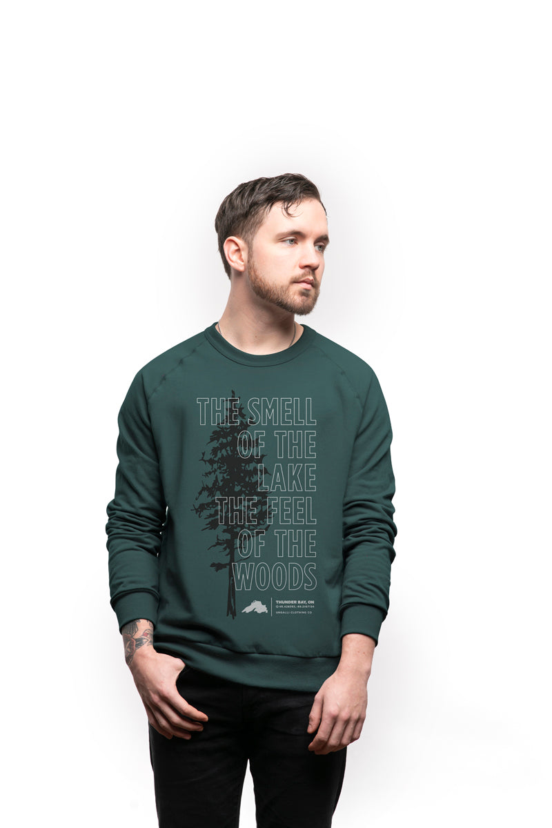 Organically made green unisex crew neck pull over sweater with white text