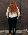 Black ethically made unisex joggers with white detailing