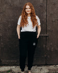 Black ethically made unisex joggers with white detailing