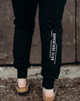 Black ethically made unisex joggers with white detailing