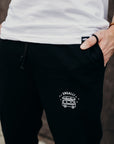 Black ethically made unisex joggers with white detailing